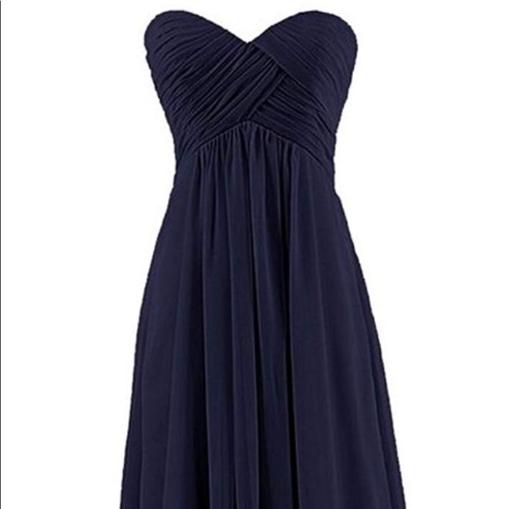 Long navy blue bridesmaid dress.